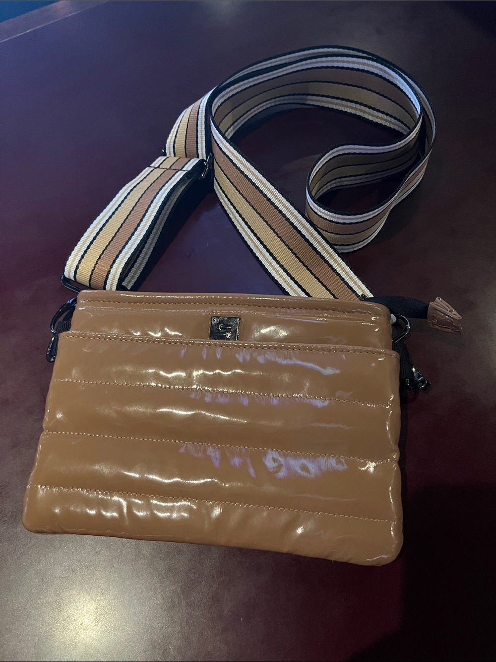THINK ROYLN Glossy Tan Quilted Crossbody with Striped Strap